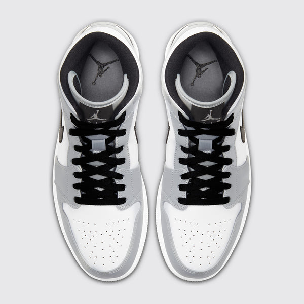Air Jordan 1 Mid Light Smoke Grey sneaker – top view of the pair