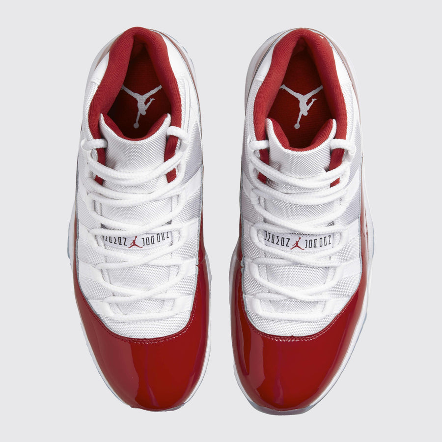 Air Jordan 11 Varsity Red sneaker – top view of the pair