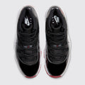 Air Jordan 11 Bred sneaker – top view of the pair