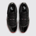 Air Jordan 11 Low Bred sneaker – top view of the pair