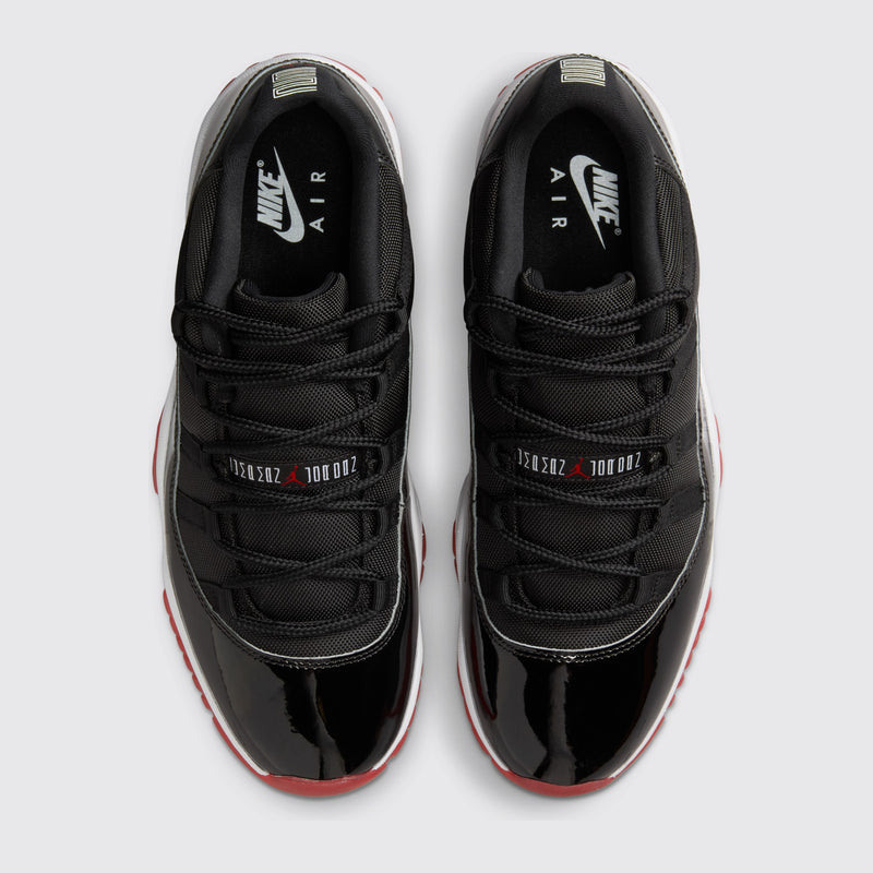 Air Jordan 11 Low Bred sneaker – top view of the pair