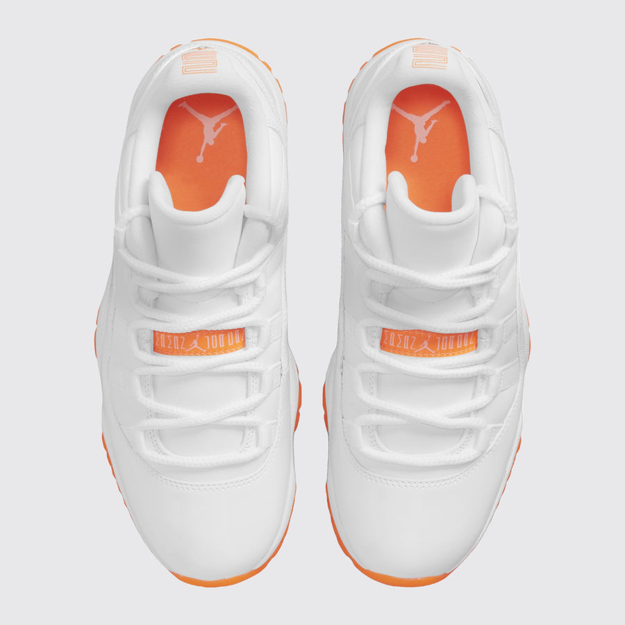 Women's Air Jordan 11 Low Bright Citrus sneaker – top view of the pair