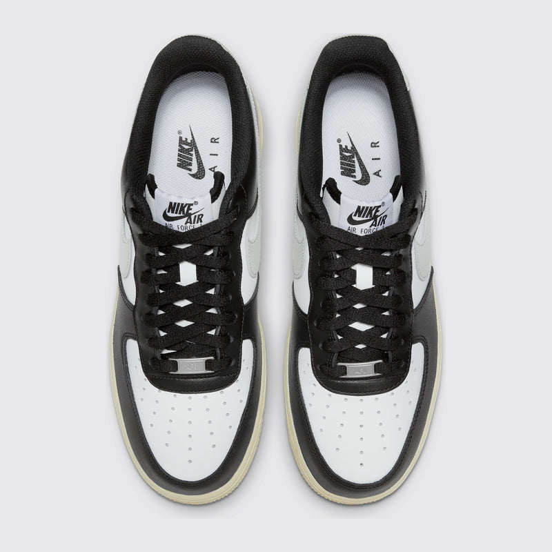 Nike Air Force 1 '07 White Coconut Milk Black sneaker – top view of the pair