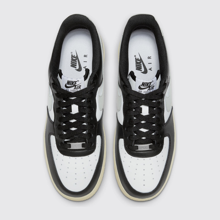 Nike Air Force 1 '07 White Coconut Milk Black sneaker – top view of the pair