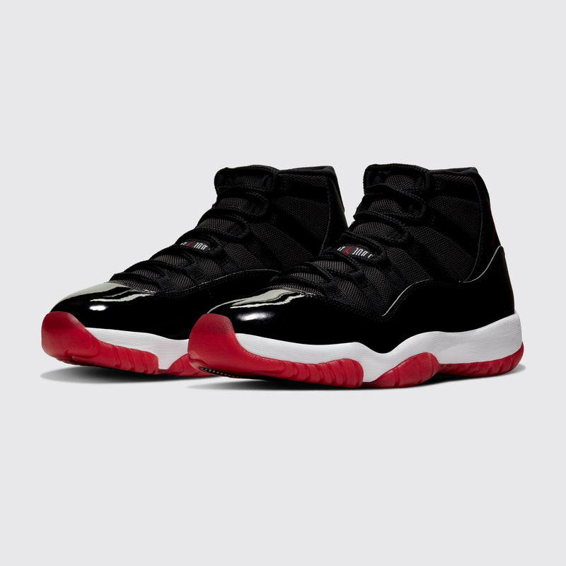 Air Jordan 11 Bred sneaker – three-quarter view of the pair