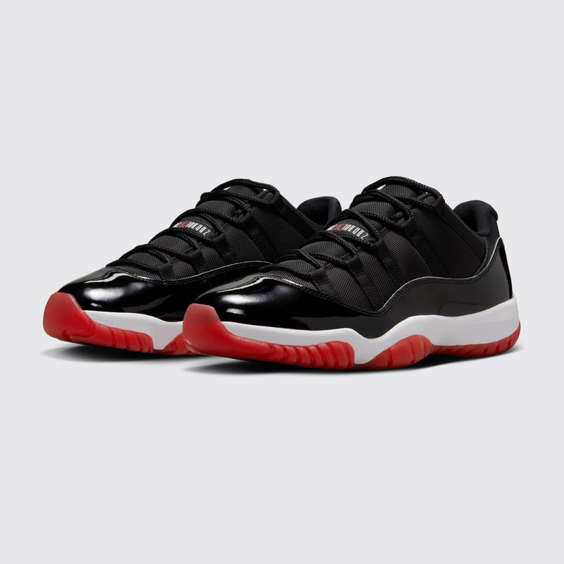 Air Jordan 11 Low Bred sneaker – three-quarter view of the pair
