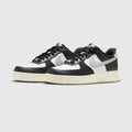 Nike Air Force 1 '07 White Coconut Milk Black sneaker – three-quarter view of the pair