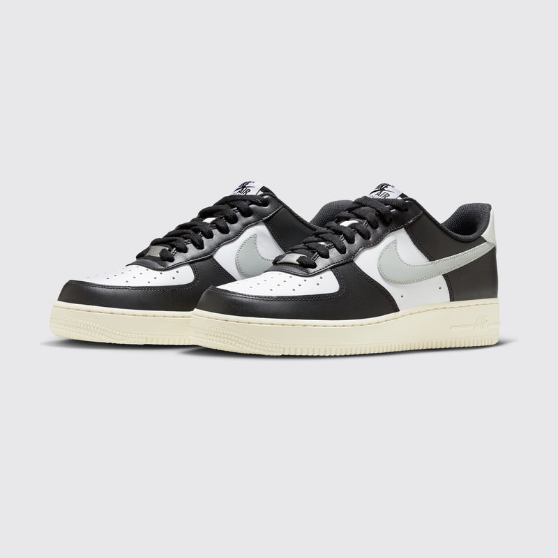 Nike Air Force 1 '07 White Coconut Milk Black sneaker – three-quarter view of the pair