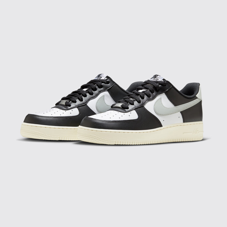 Nike Air Force 1 '07 White Coconut Milk Black sneaker – three-quarter view of the pair