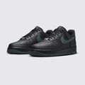 Nike Air Force 1 '07 Black Vintage Green sneaker – three-quarter view of the pair