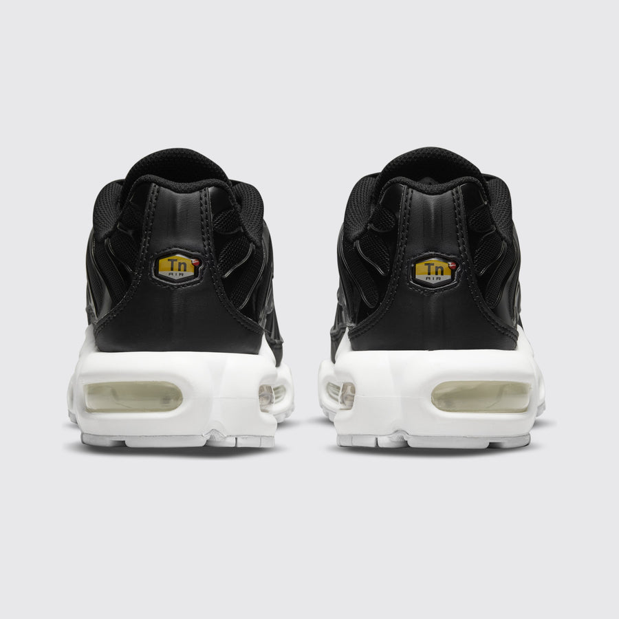 Women's Nike Air Max Plus Black White sneaker – back view of the pair