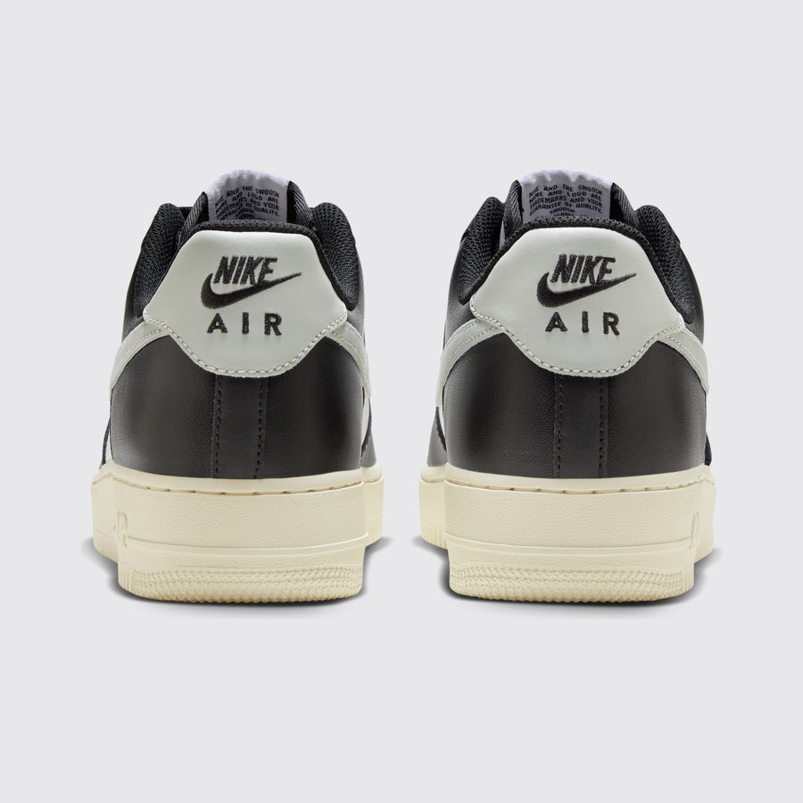 Nike Air Force 1 '07 White Coconut Milk Black sneaker – back view of the pair