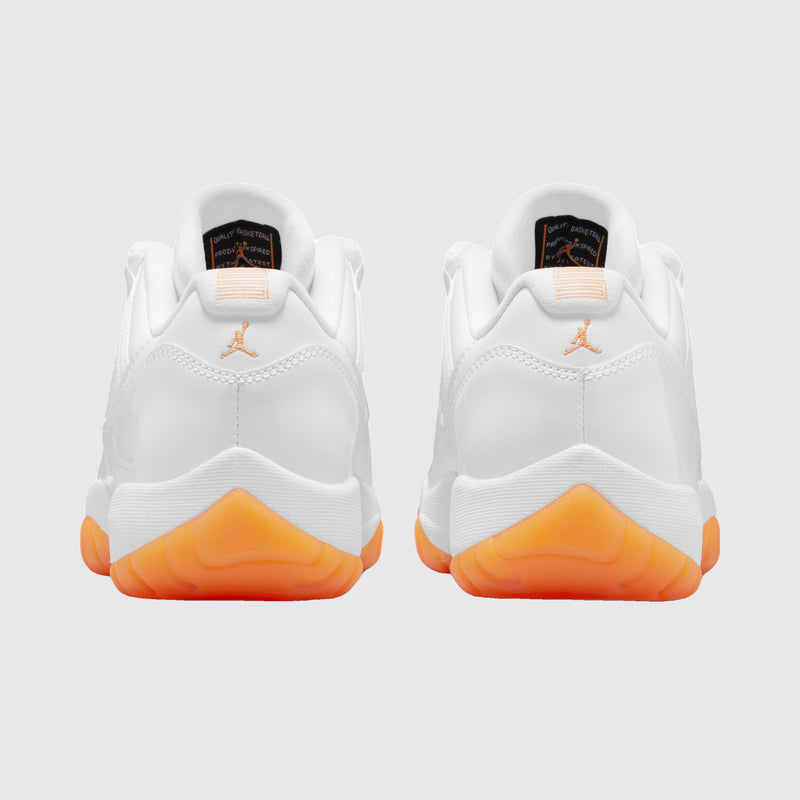 Women's Air Jordan 11 Low Bright Citrus sneaker – back view of the pair