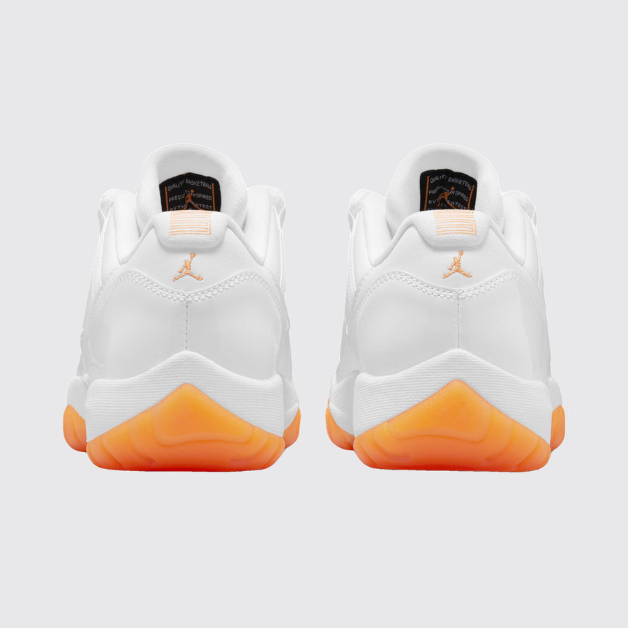 Women's Air Jordan 11 Low Bright Citrus sneaker – back view of the pair