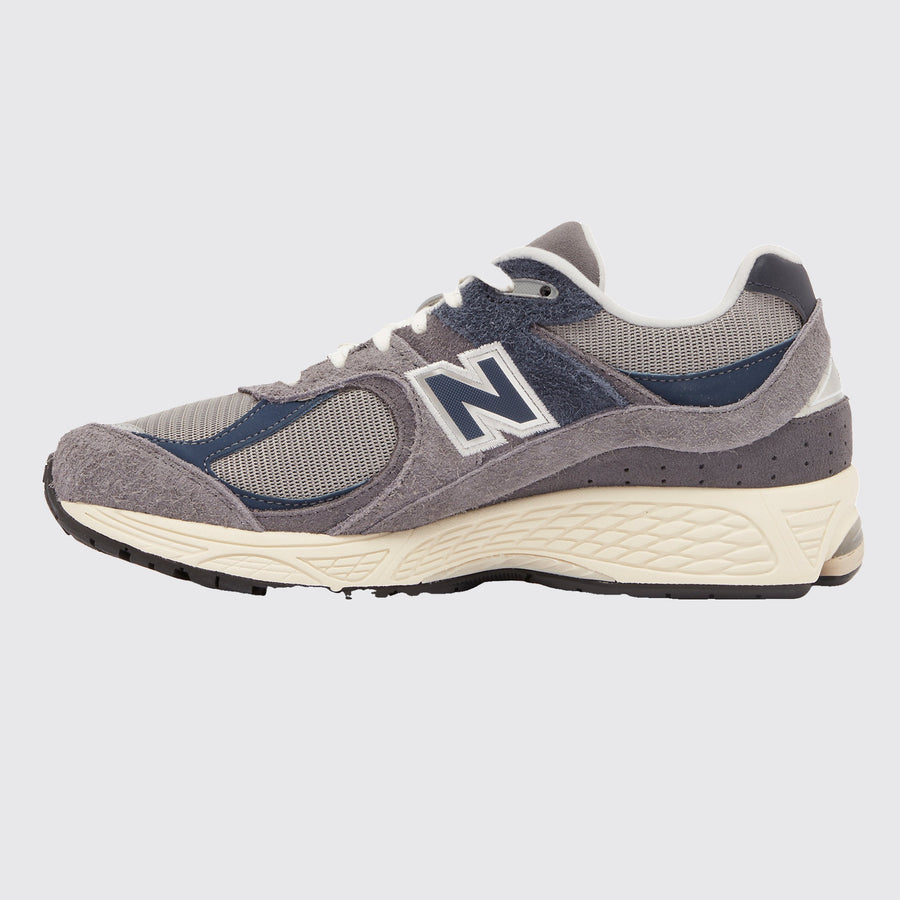 New Balance 2002R Navy Castlerock sneaker – side view