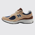 New Balance 2002R Beige Navy sneaker – side view