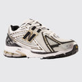 New Balance 1906R White Black Gold sneaker – front three-quarter view