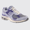 New Balance 2002R Protection Pack Purple Sneaker – Dreiviertel-Vorderansicht