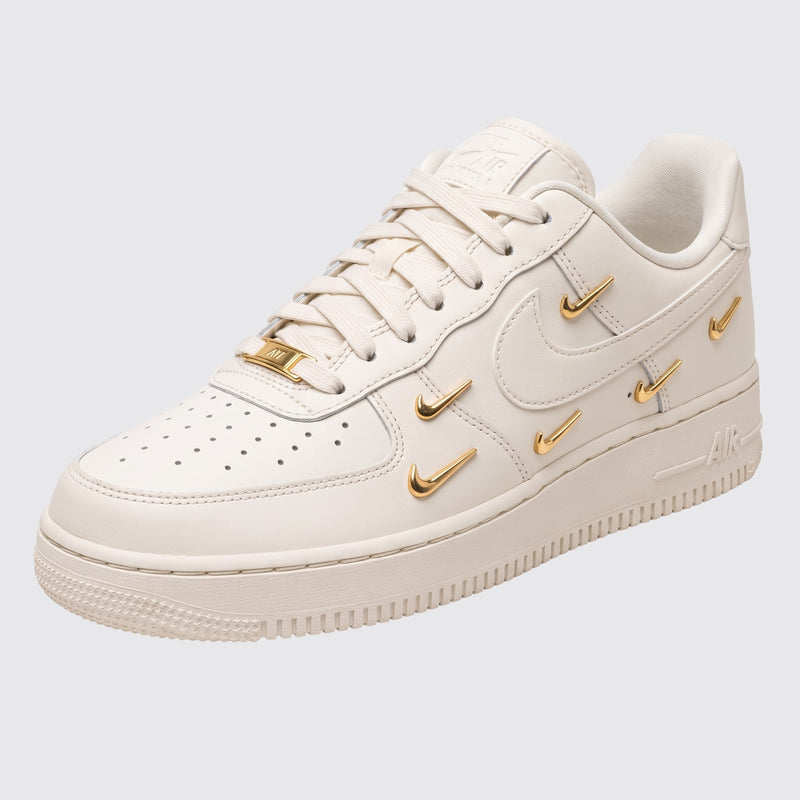 Women's Nike Air Force 1 '07 LX Mini Swoosh Gold sneaker – front three-quarter view