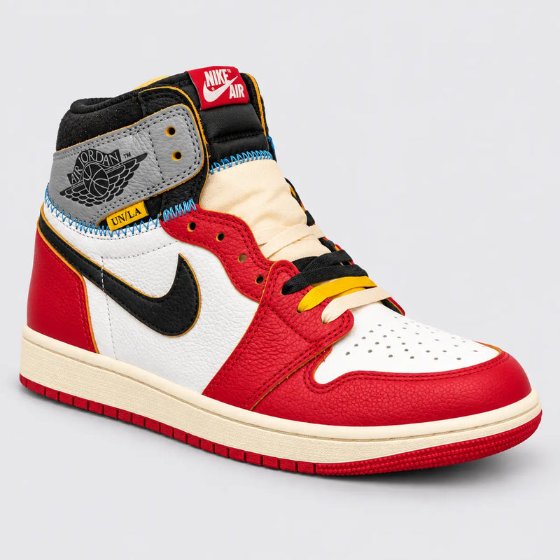 Front angle of red and white Air Jordan 1 High x Union LA showing multicolour laces and yellow UN/LA tab